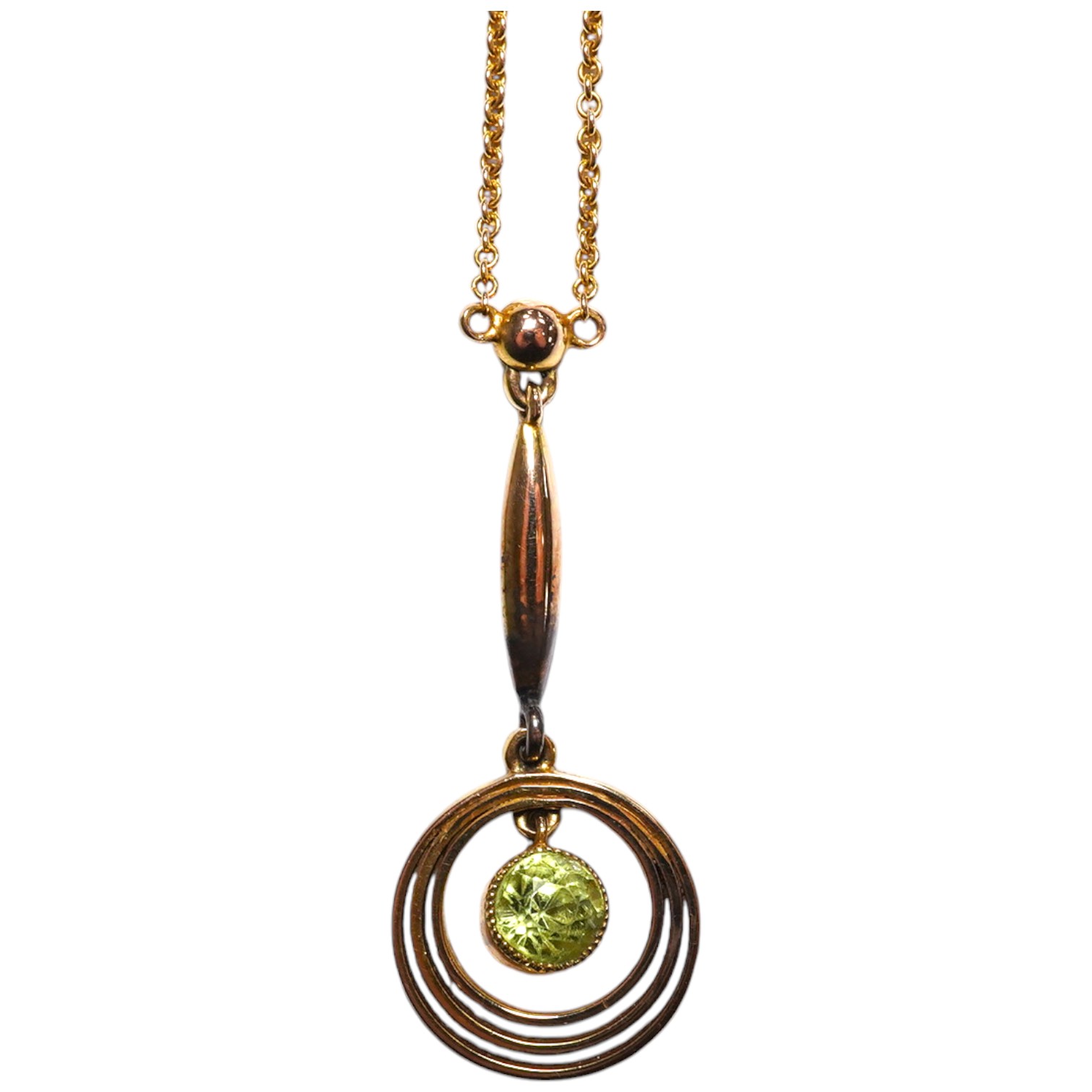 An Edwardian 9ct and peridot set drop pendant necklace, 47cm, gross weight 2.5 grams. Condition - fair to good